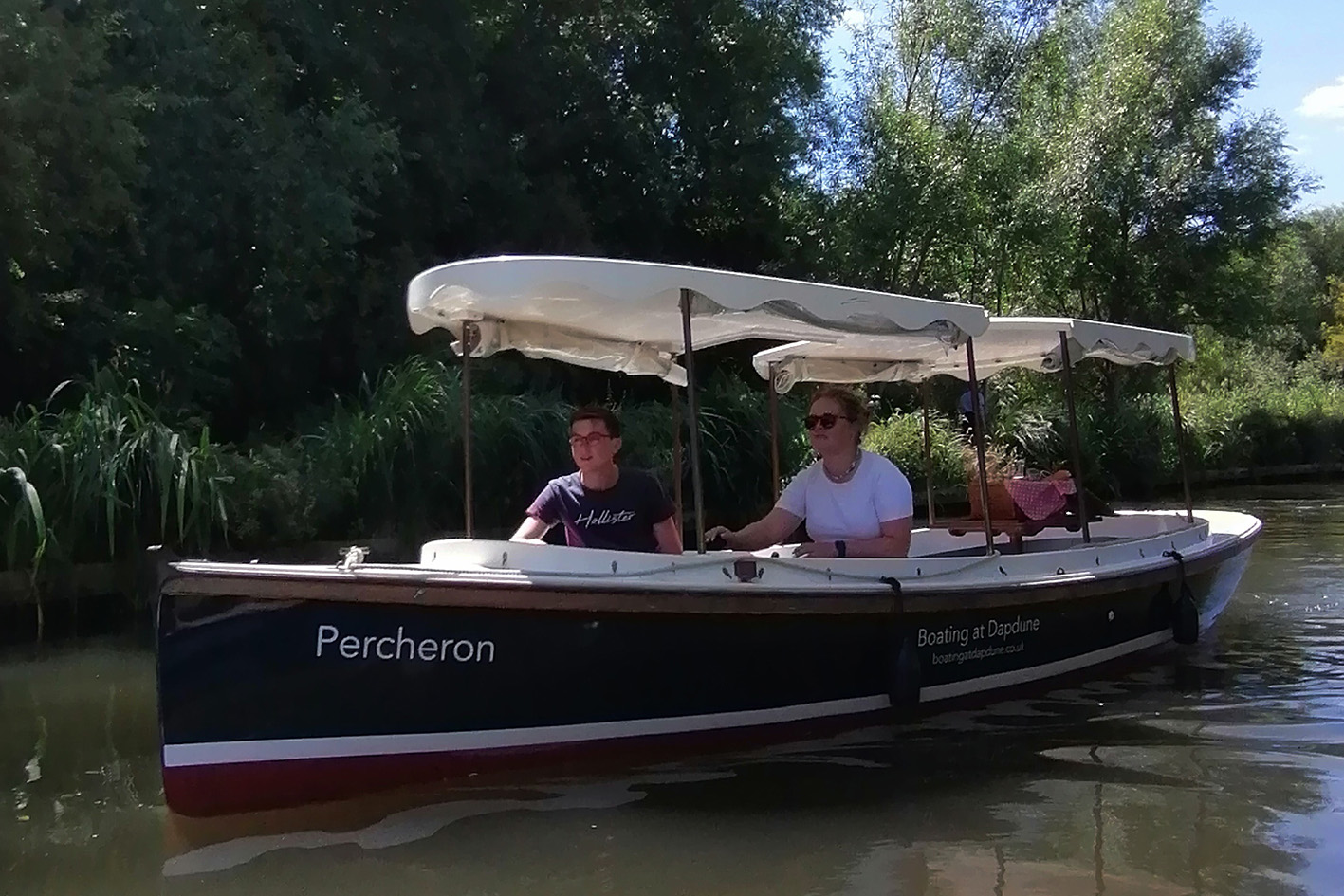 Comfortable day hire boat at Dapdune Wharf, Guildford